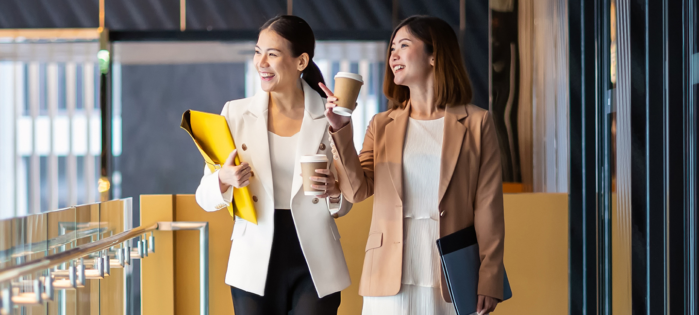 Two coworkers walking