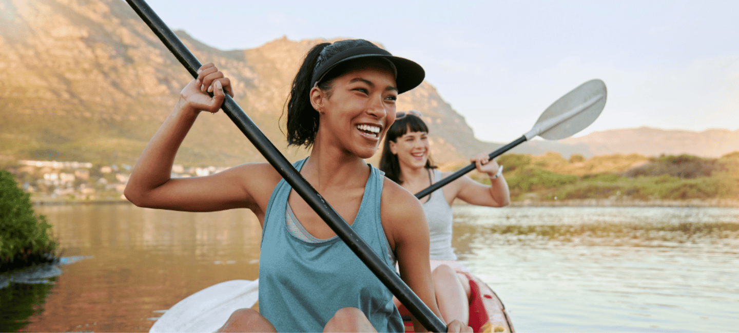 women on kayak