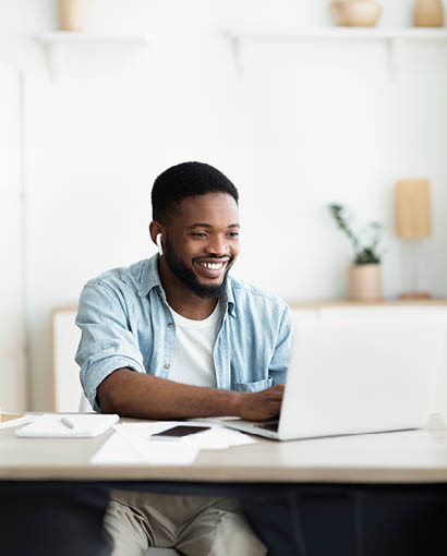 man looking at computer