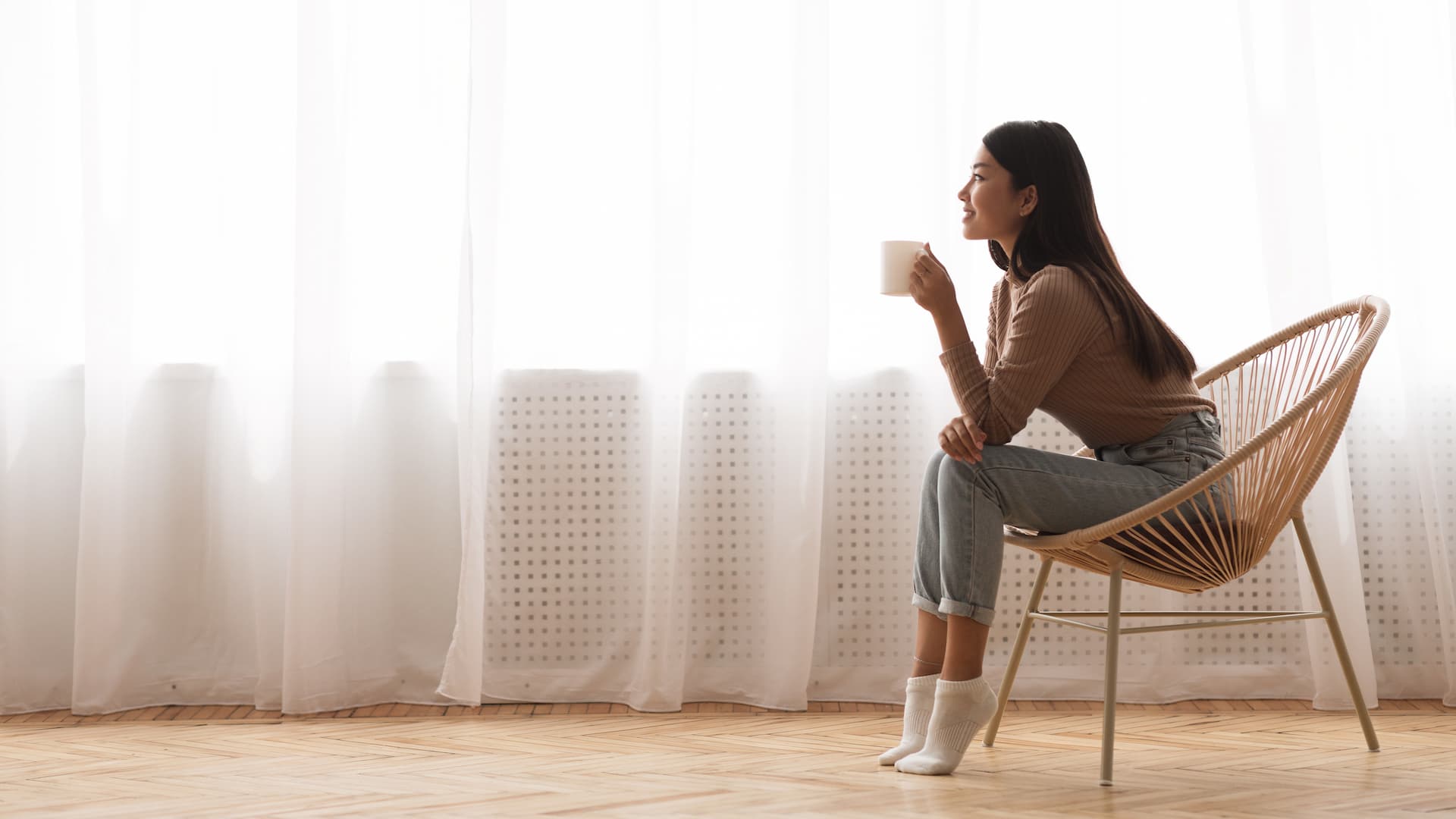 Women peaceful at home enjoying a coffee