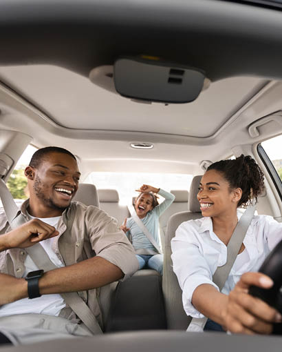 family in their car