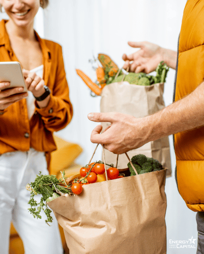 couple holding groceries