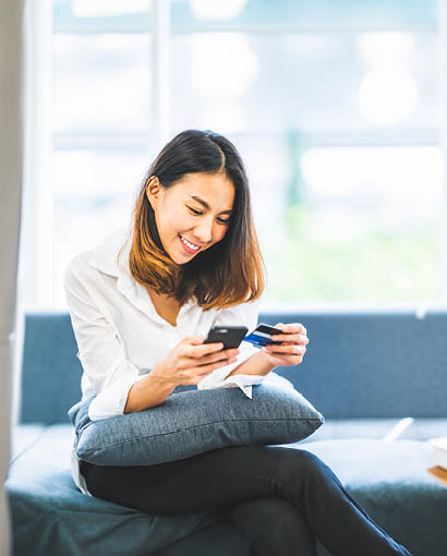 woman paying card