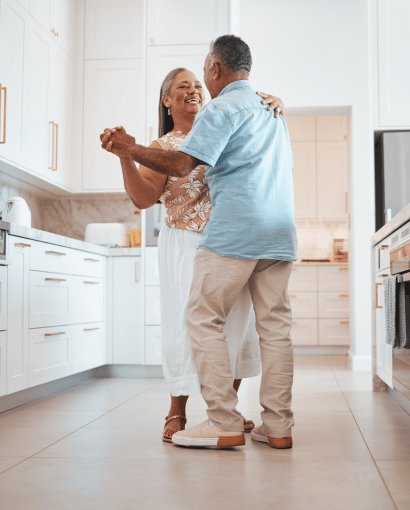 couple dancing in kitchen